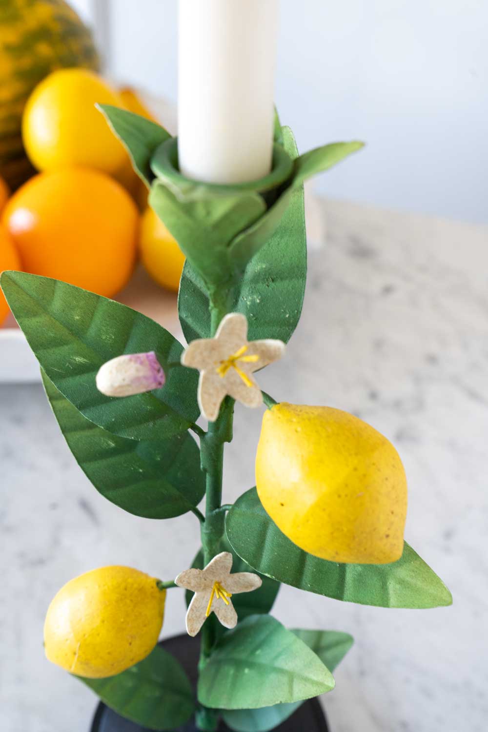 Detalle Candelabro De Metal Con Limones Cristina Oria