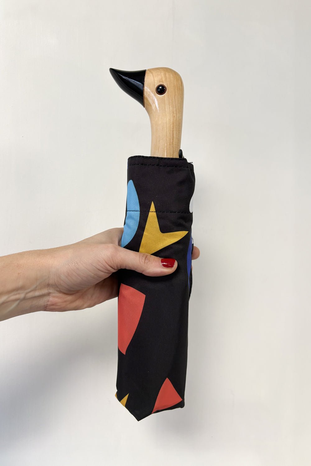 Paraguas Con Diseño Abstracto Marrón Chocolate Y Mango Con Cabeza De Pato Cristina Oria