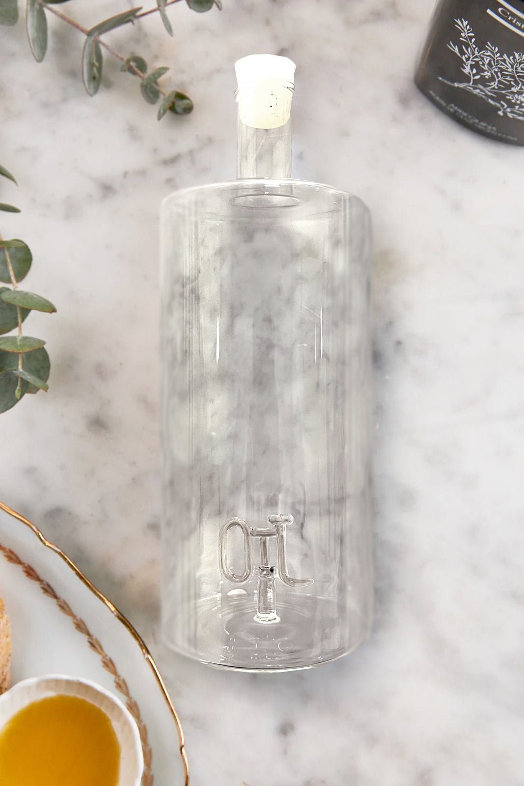 Detalle Aceitera Bolsa Aceite AOVE Arbequina CO & Aceitera Cristina Oria