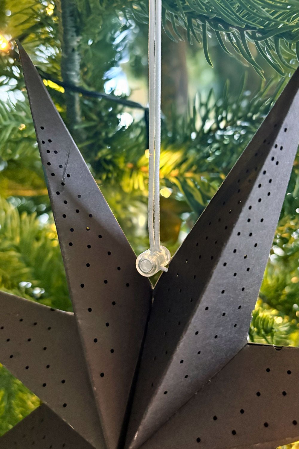 Detalle Enganche Adorno Estrella Negra Cristina Oria 