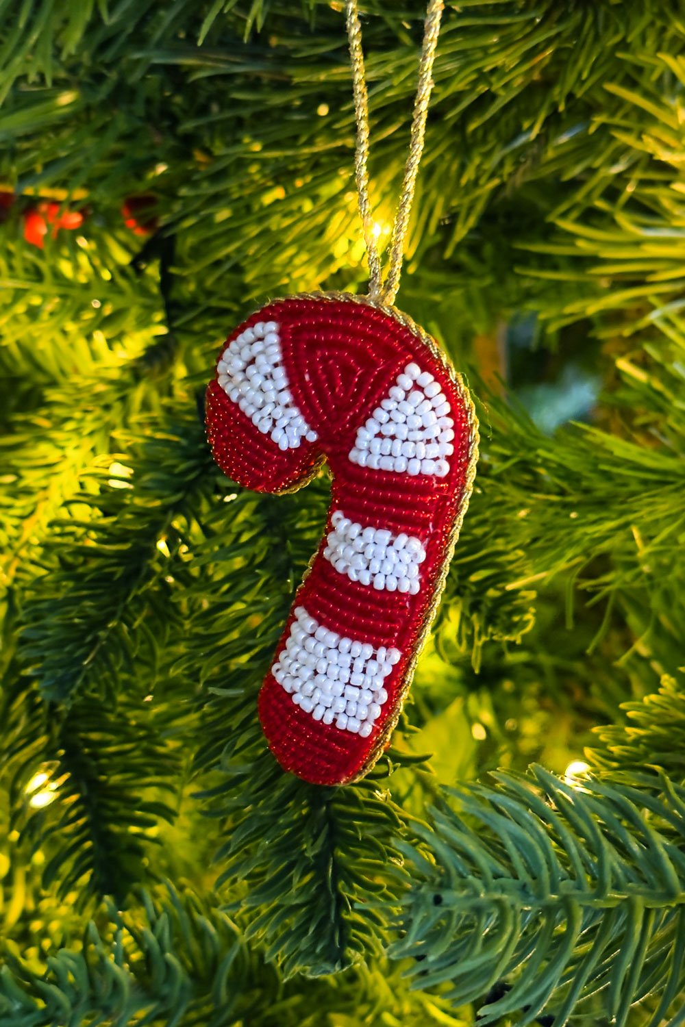 Detalle Textura Adorno Bastón De Caramelo Bordado Con Cuentas Cristina Oria 