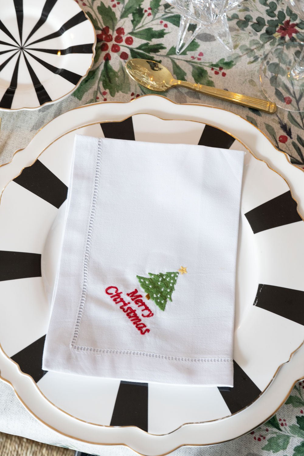 Guardanapo em algodão com detalhe de bainha aberta, estampado natalício