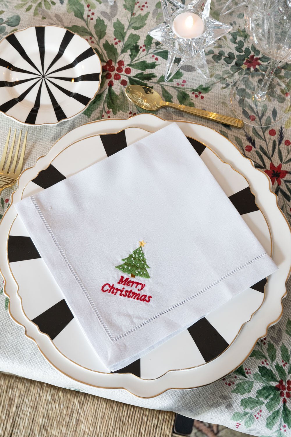 Guardanapo em algodão com detalhe de bainha aberta, estampado natalício