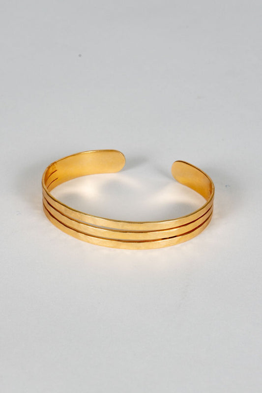 Pulseira dourada ajustável com design de três argolas