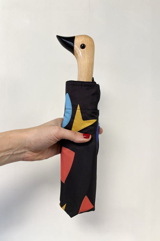 Paraguas Con Diseño Abstracto Marrón Chocolate Y Mango Con Cabeza De Pato Cristina Oria 