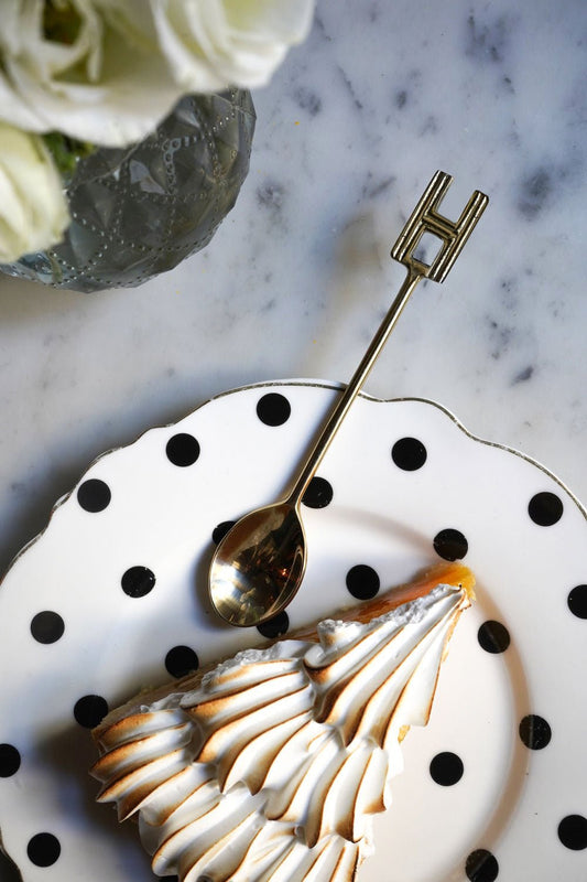 Cucchiaino in bronzo con iniziale H