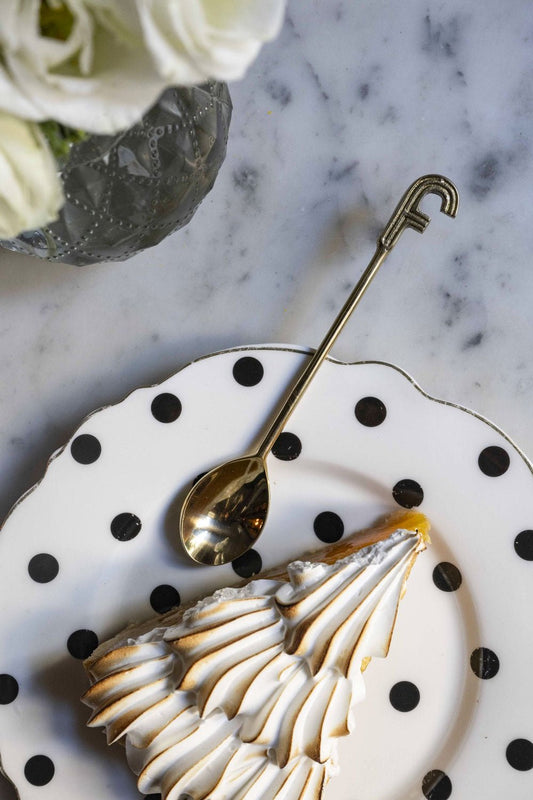 Cuillère dorée initiale F