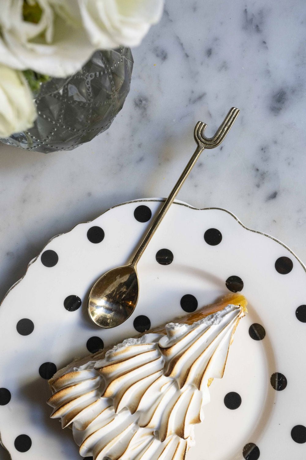 Anfänglicher J-Bronze-Teelöffel