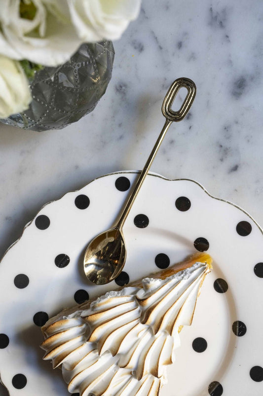 Cucchiaino in bronzo iniziale O