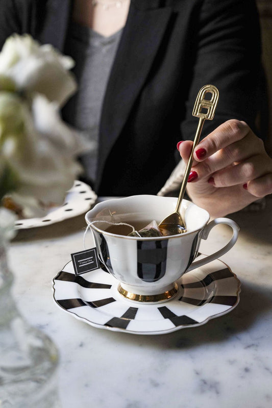 Cuillère dorée initiale A