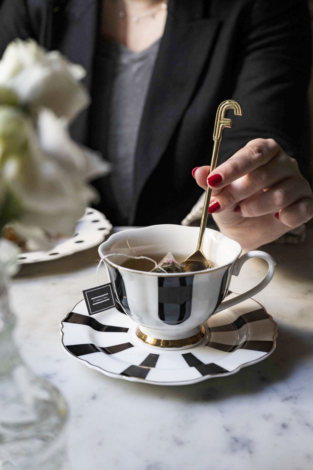 Cucharita de Bronce Inicial F