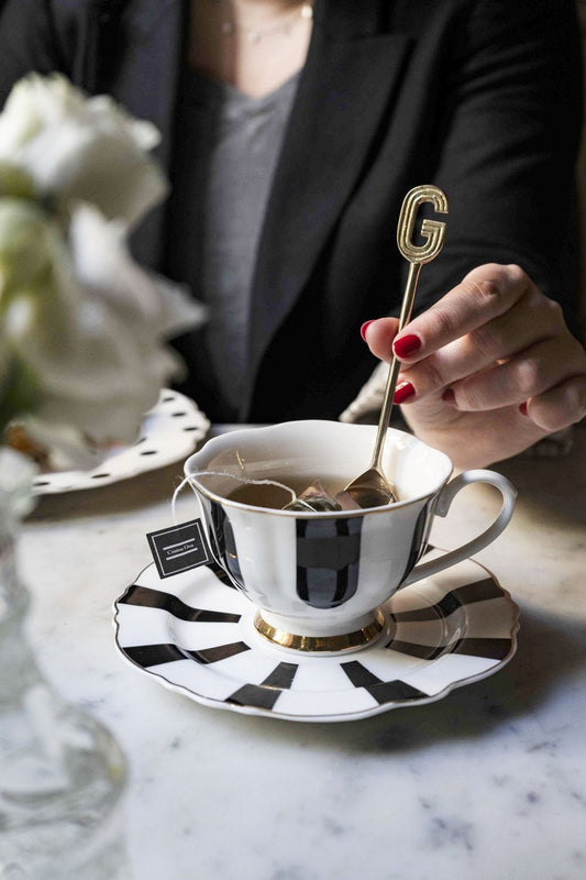 Cuillère dorée initiale G