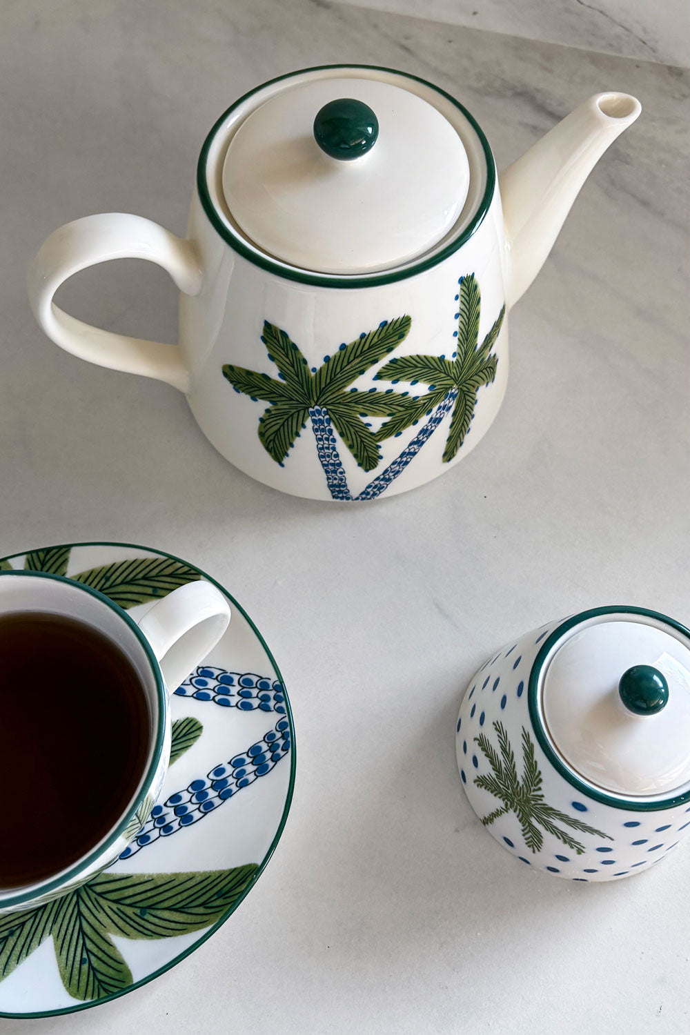 Detalles Tetera De Porcelana Diseño Palmeras Cristina Oria