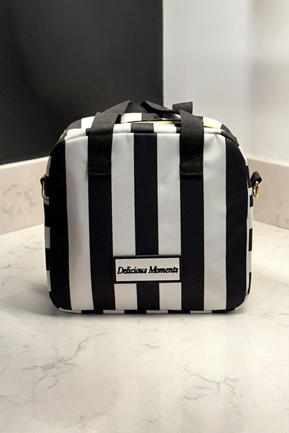 Sac Isotherme Blanc et Noir avec le message “Delicious Moments”