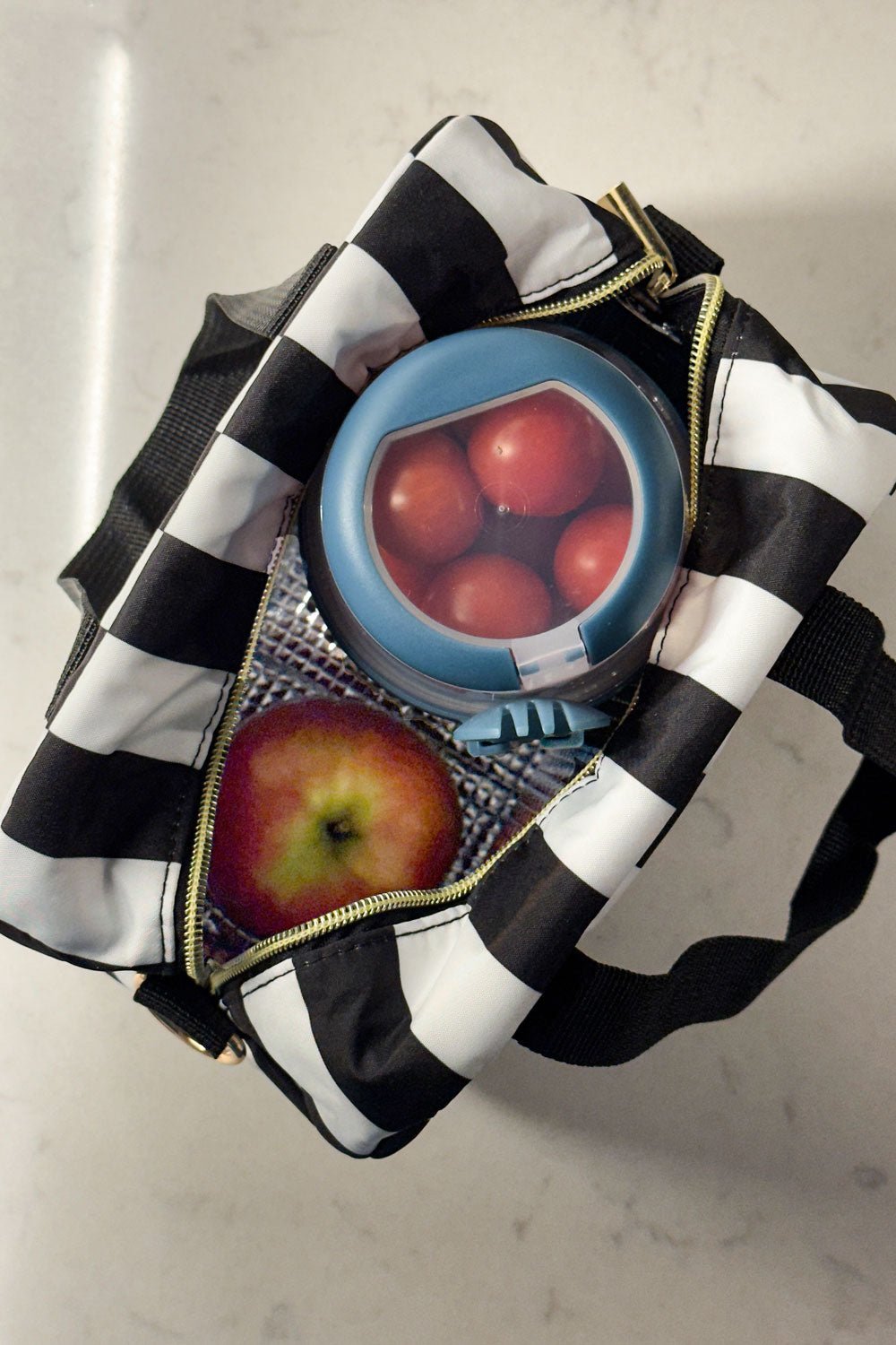 Sac Isotherme Blanc et Noir avec le message “Delicious Moments”