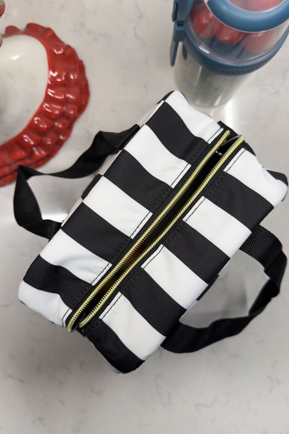 Sac Isotherme Blanc et Noir avec le message “Delicious Moments”