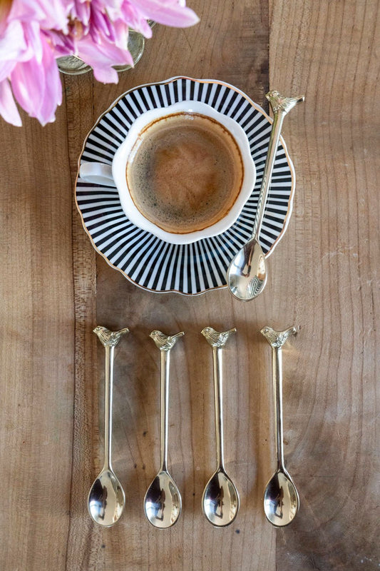 Set di 4 cucchiai in bronzo con disegno di uccelli