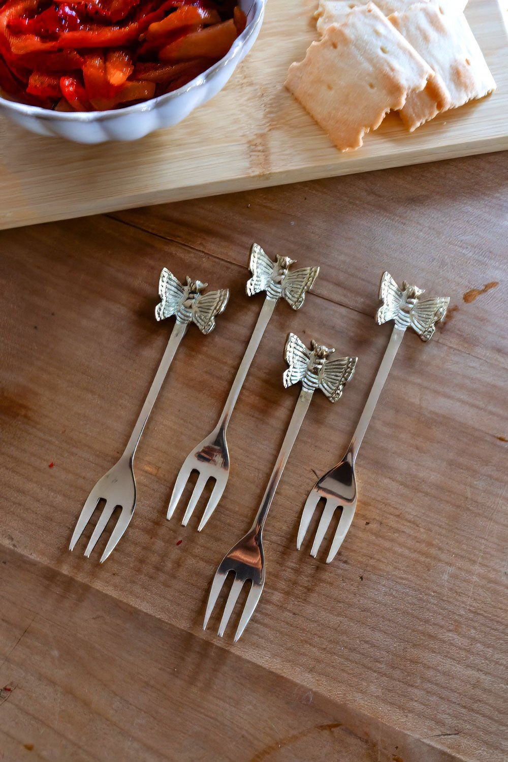 Set di 4 forchette in bronzo con design a farfalla