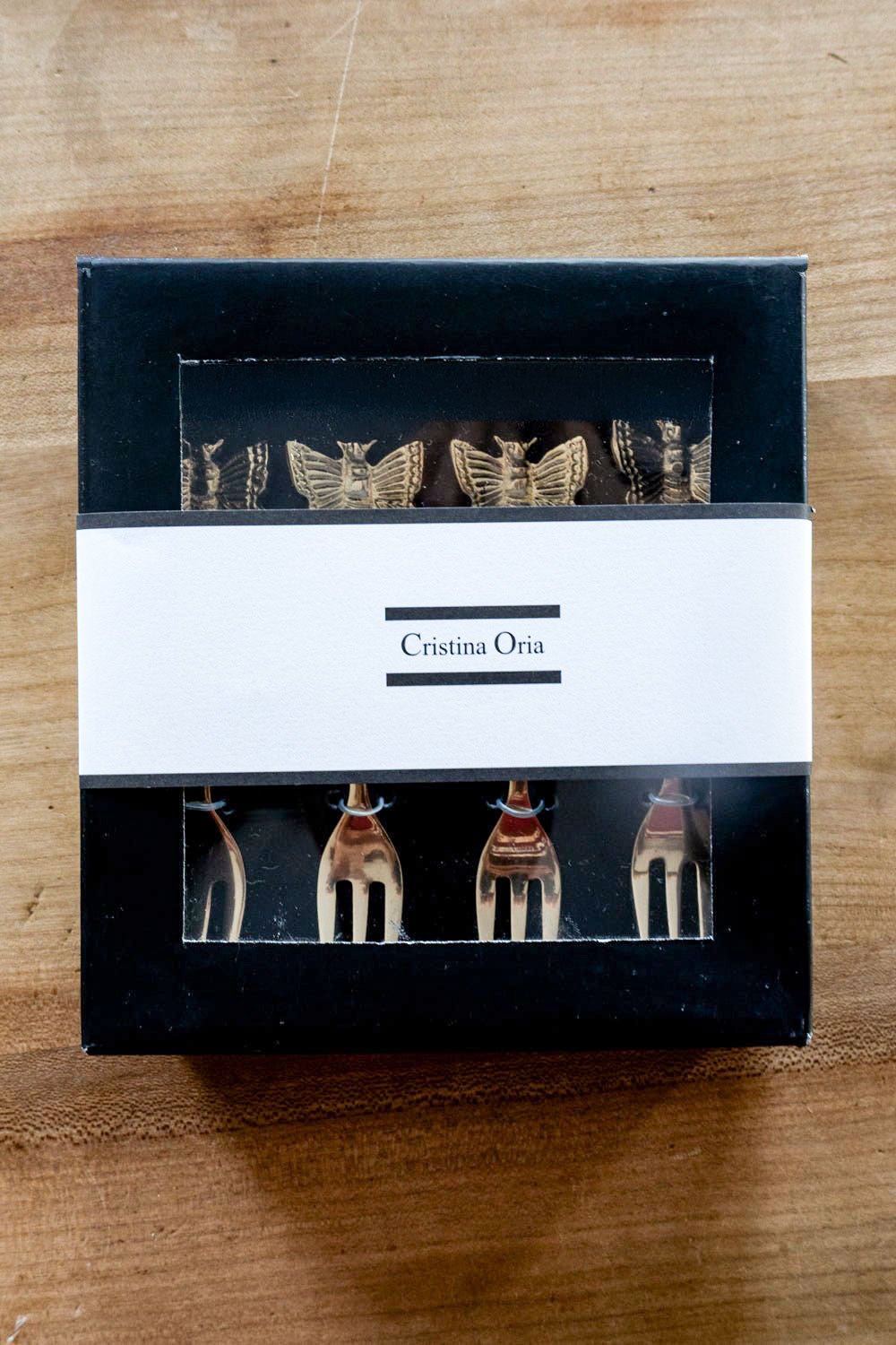 Set mit 4 Bronzelöffeln mit Vogelmotiv