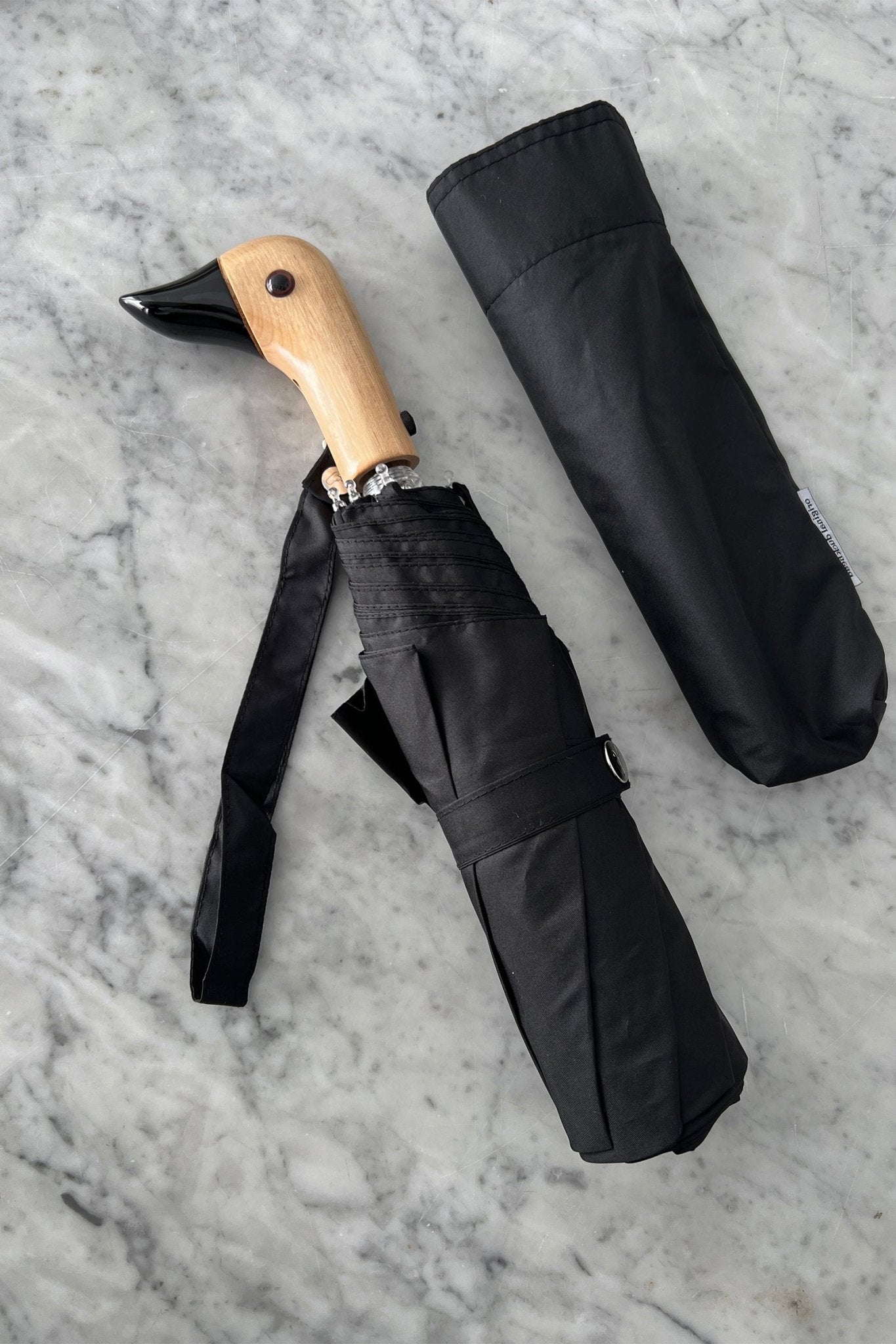 Paraguas Con Diseño Negro Y Mango Con Cabeza De Pato – Cristina Oria